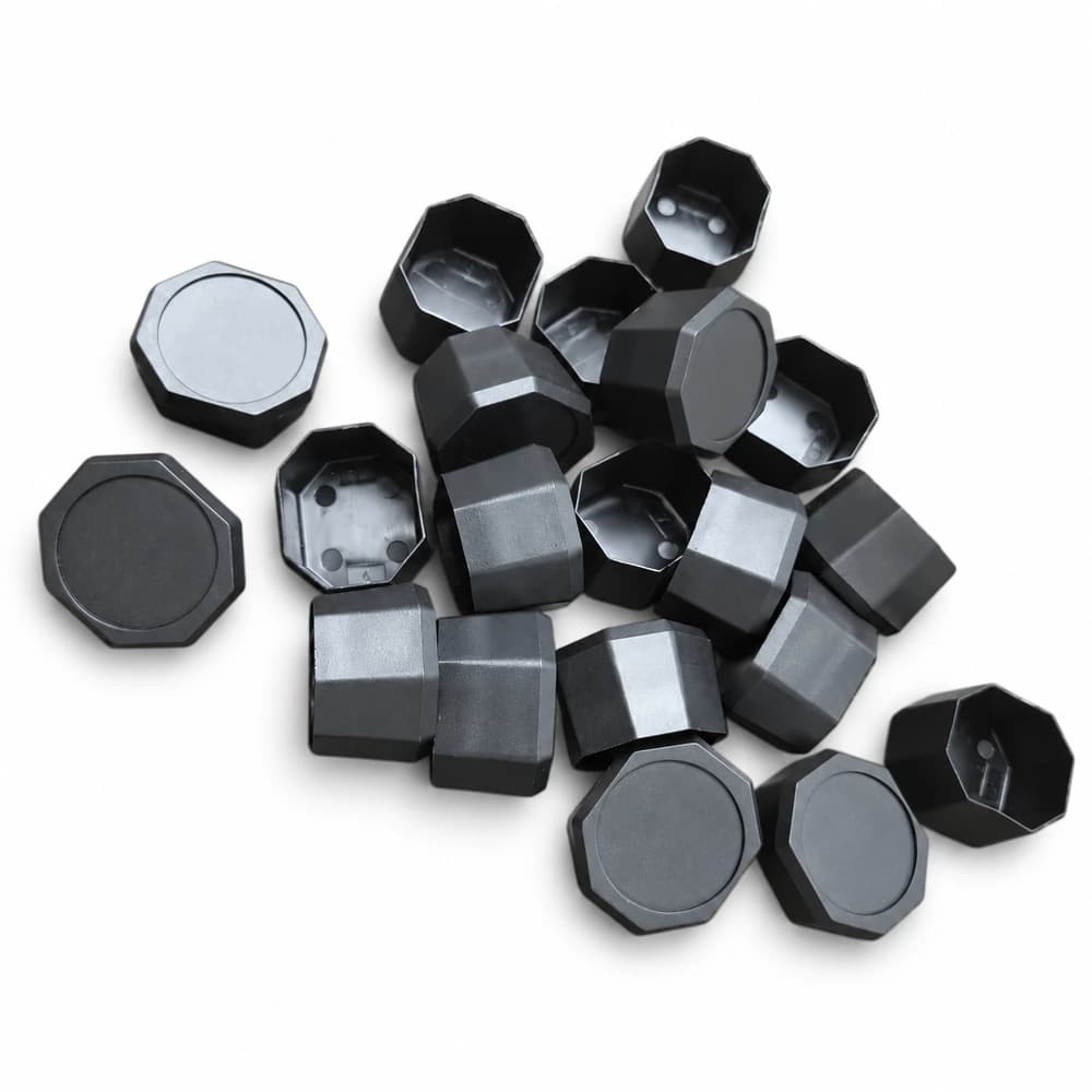 Black pickleball paddle butt cap samples on a white background