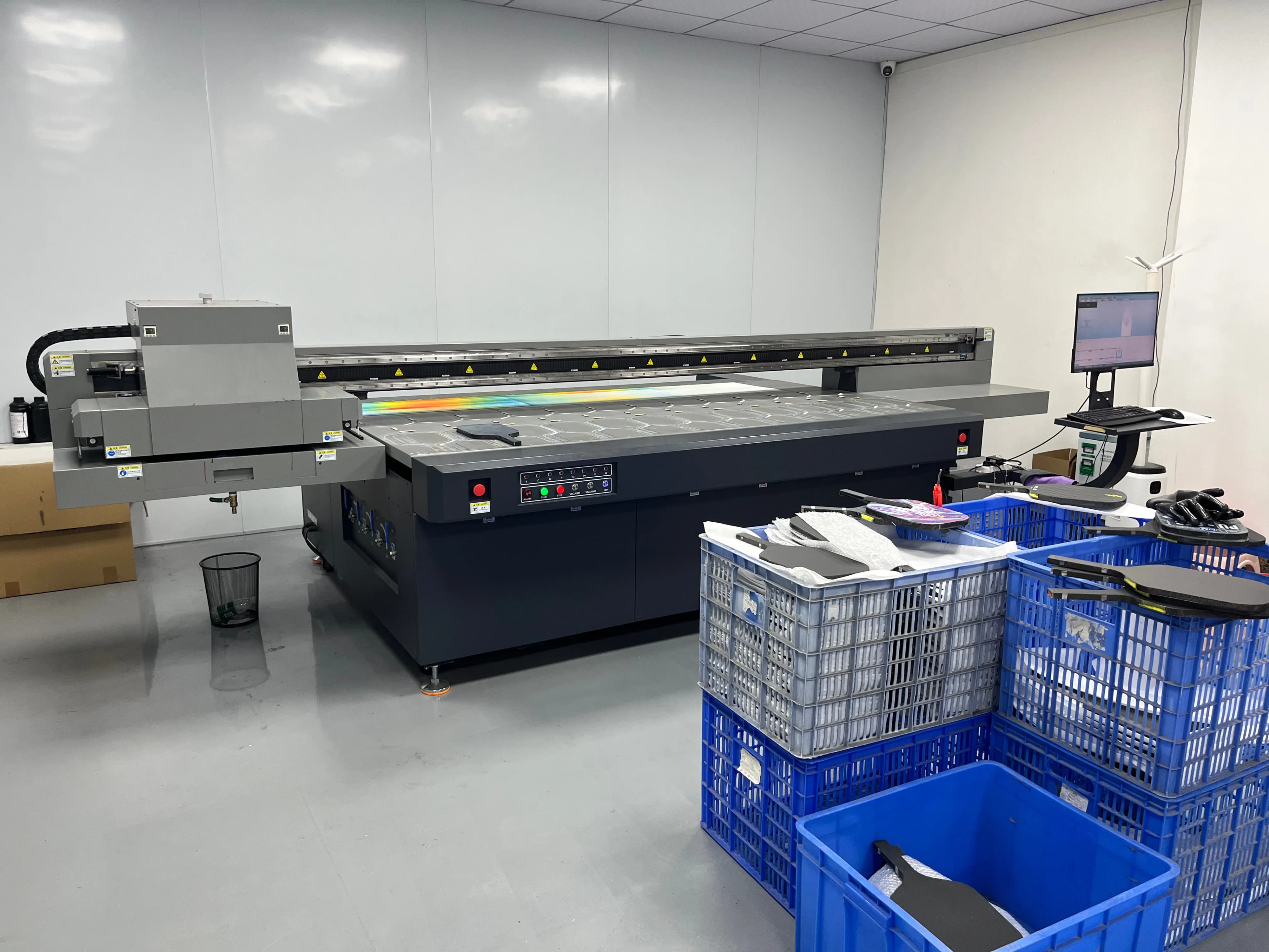 Factory printing equipment for custom paddle graphics