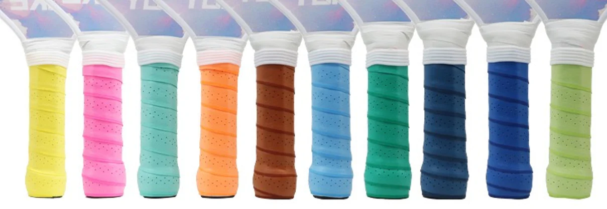 Finished pickleball handles wrapped in multiple grip colors
