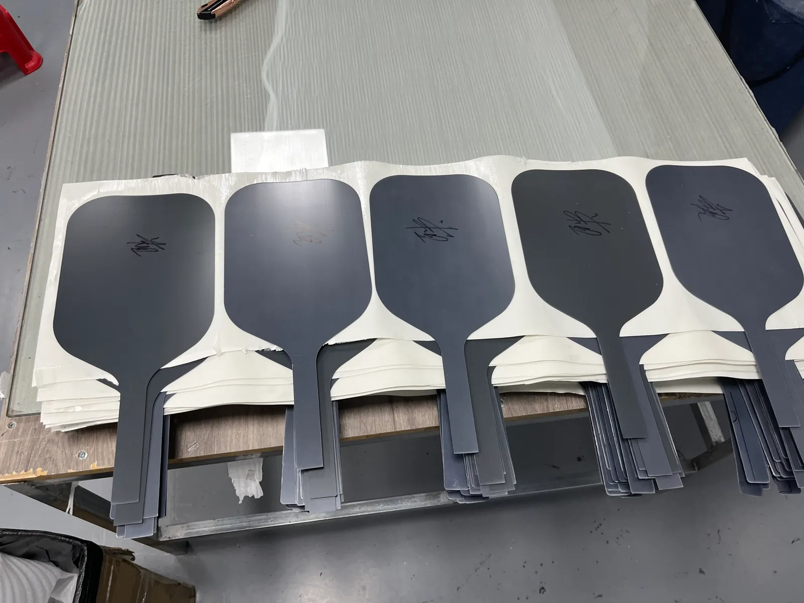 Carbon fiber paddle faces prepared in the SHUEN factory